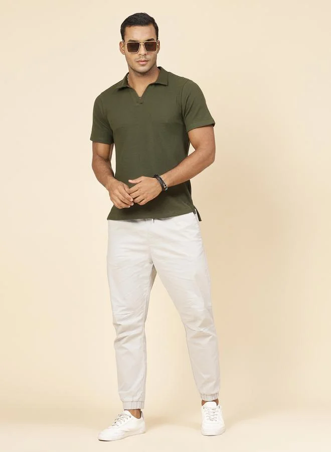 تايك تو بولو محبوك بنمط وافل بياقة مفتوحة